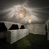 white marquee with beaded chandeliers