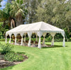 marquee in a garden with cushions and rugs for a bridal shower