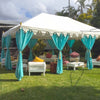 turquoise marquee in a garden styled for a party