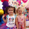 two young girls celebrating a birthday in alladin theme