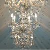 multiple chandeliers hanging from a marquee roof for hire from exotic soirees tents on the gold coast